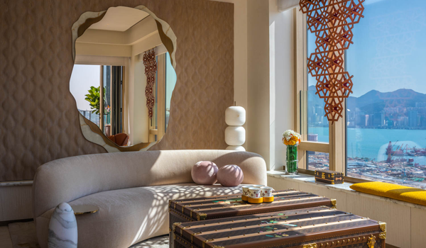 a wavy mirror in the living room of a home with ocean views