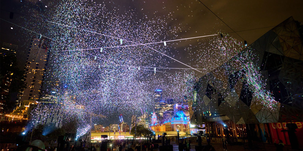 biodegradable fireworks explode at a concert