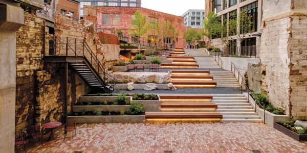outdoor steps framed by planters and greenery