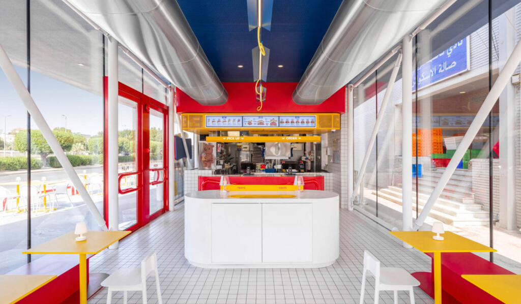 a retro eatery decorated in primary colors