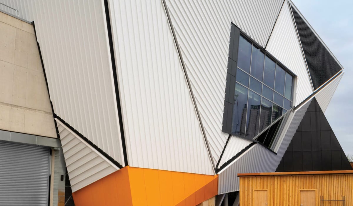 the sculptural steel facade of a cultural hub