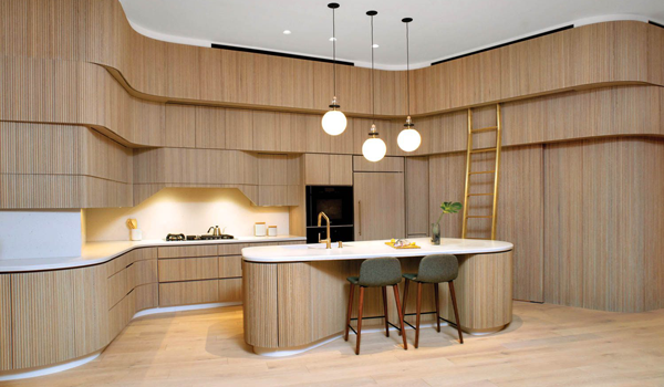 a kitchen wrapped in white oak