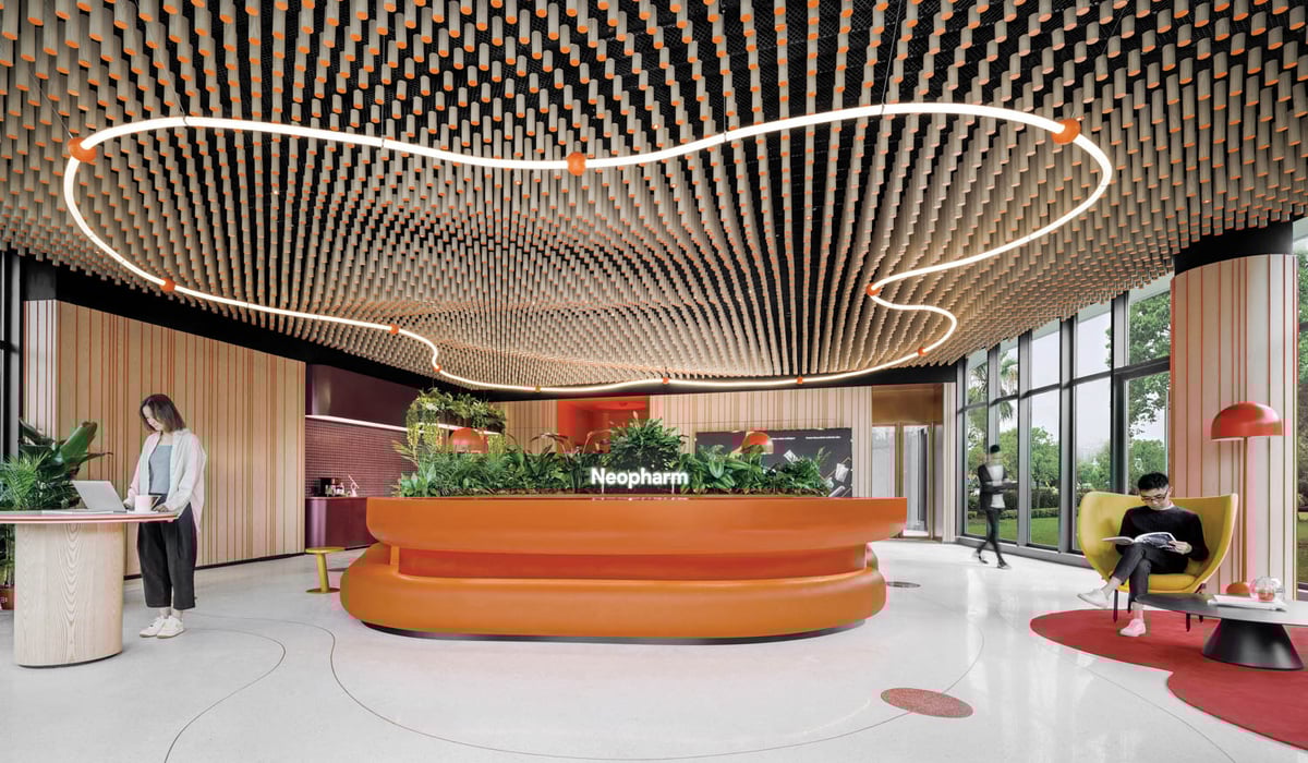 metal rods form an undulating canopy in the lobby of a Shanghai workplace