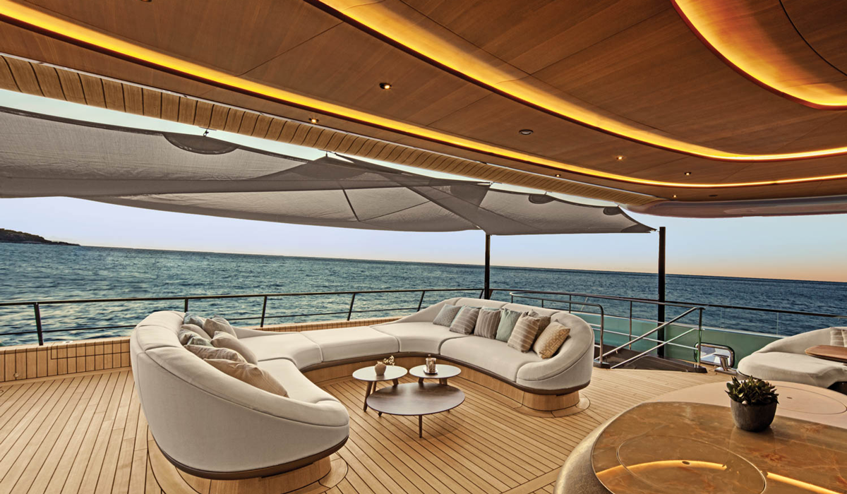 a super yacht with a connected cream sectional