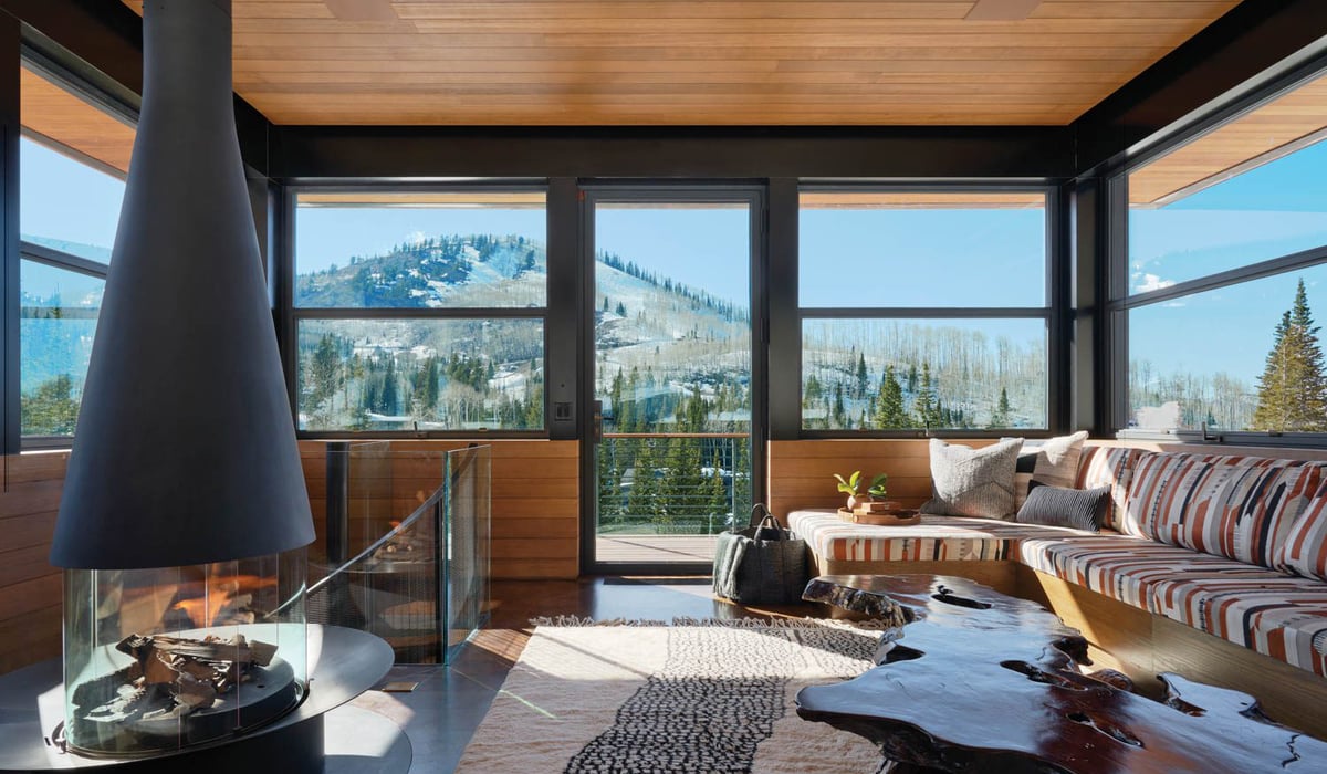 a cozy living room with mountain views