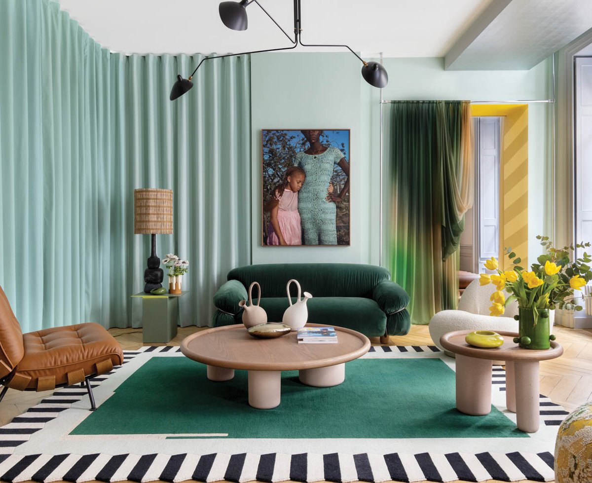 an eclectic green living room