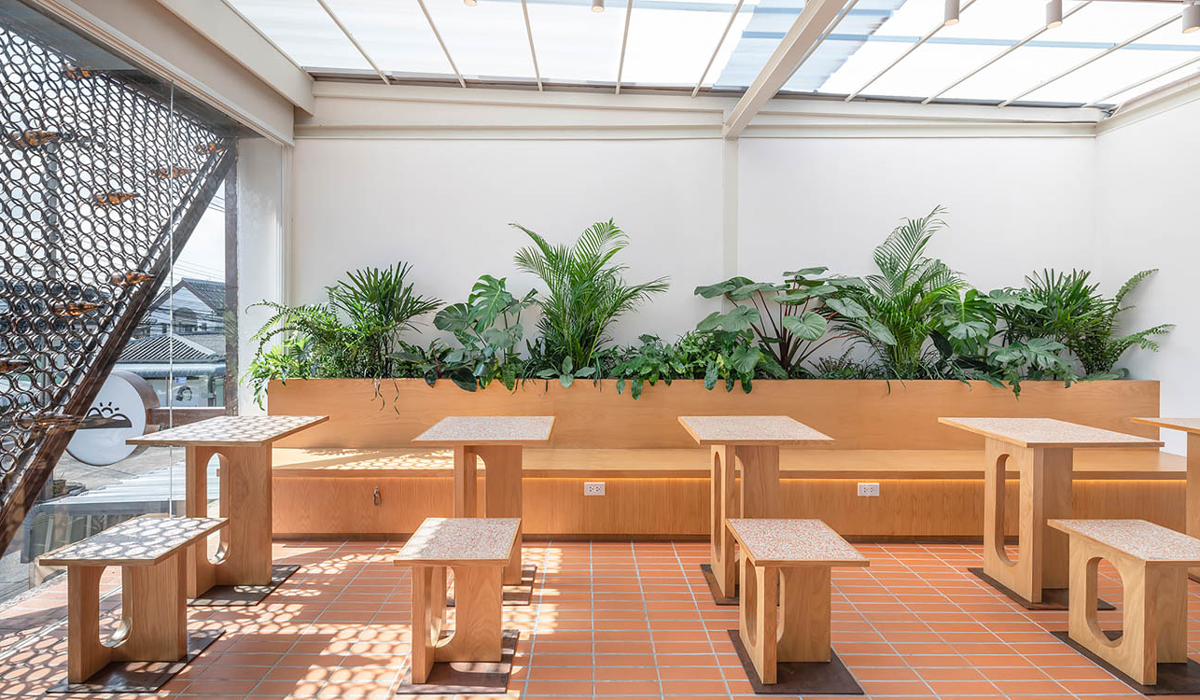 an open-air room in a coffee shop