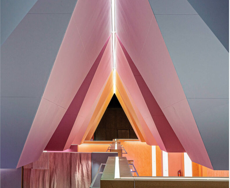 pink lights in arched building