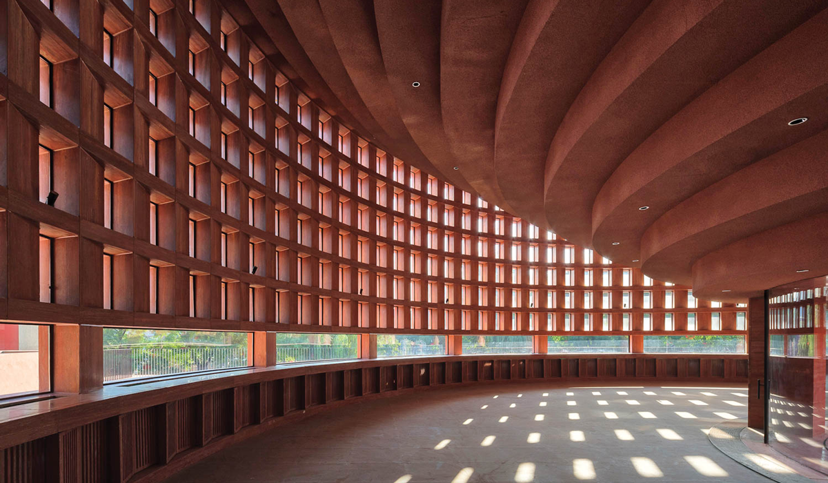 a museum addition made of a red structure