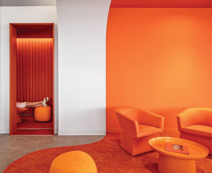 orange armchairs in office space