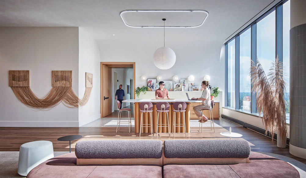 pink-hued sofa in office