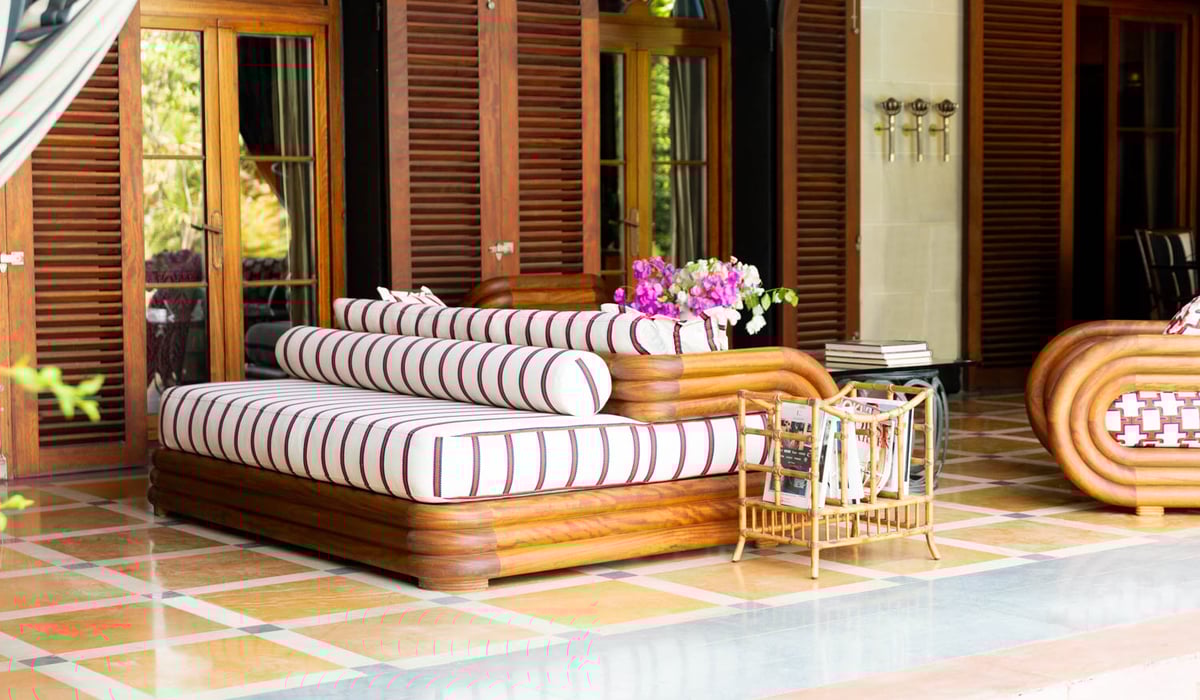 the double-sided sofa in a room