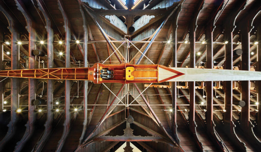 the ceiling of the UPenn Boathouse features the design of a crew boat