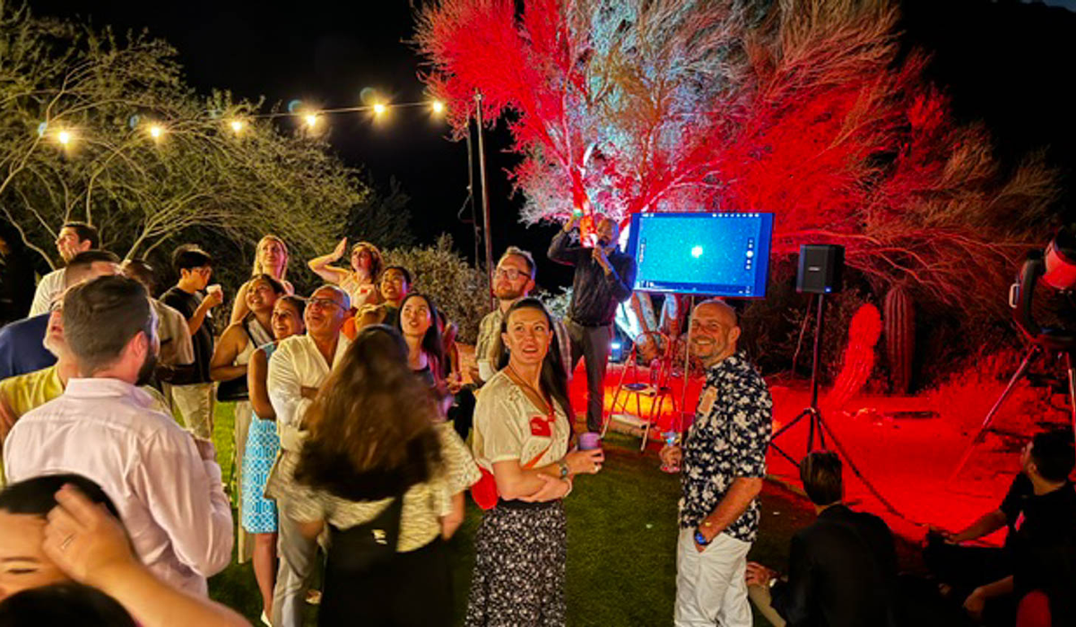 attendees star gazing at re:Source in Arizona