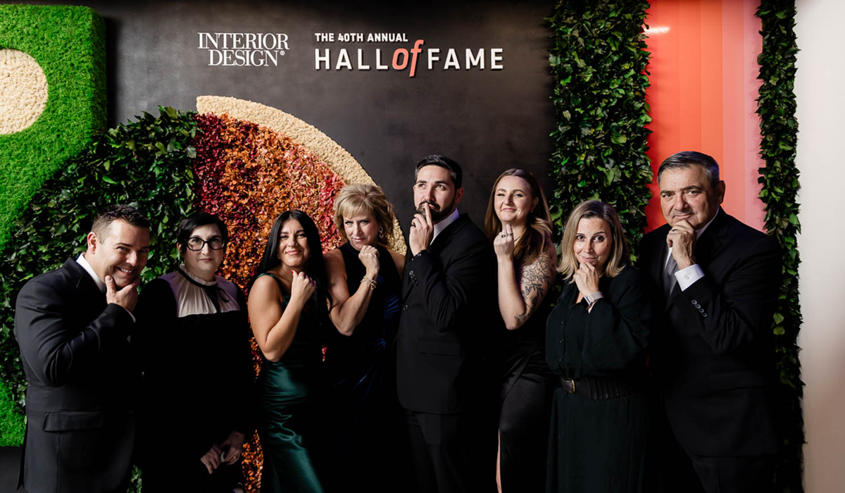 multiple people posing on the Hall of Fame red carpet
