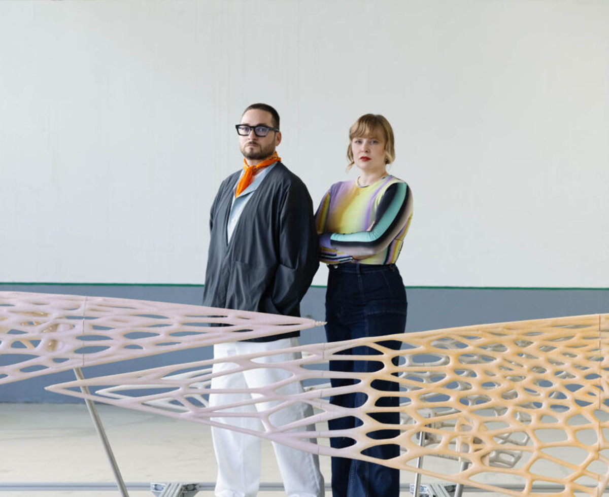 Crafting Plastics standing in front of their biomaterial