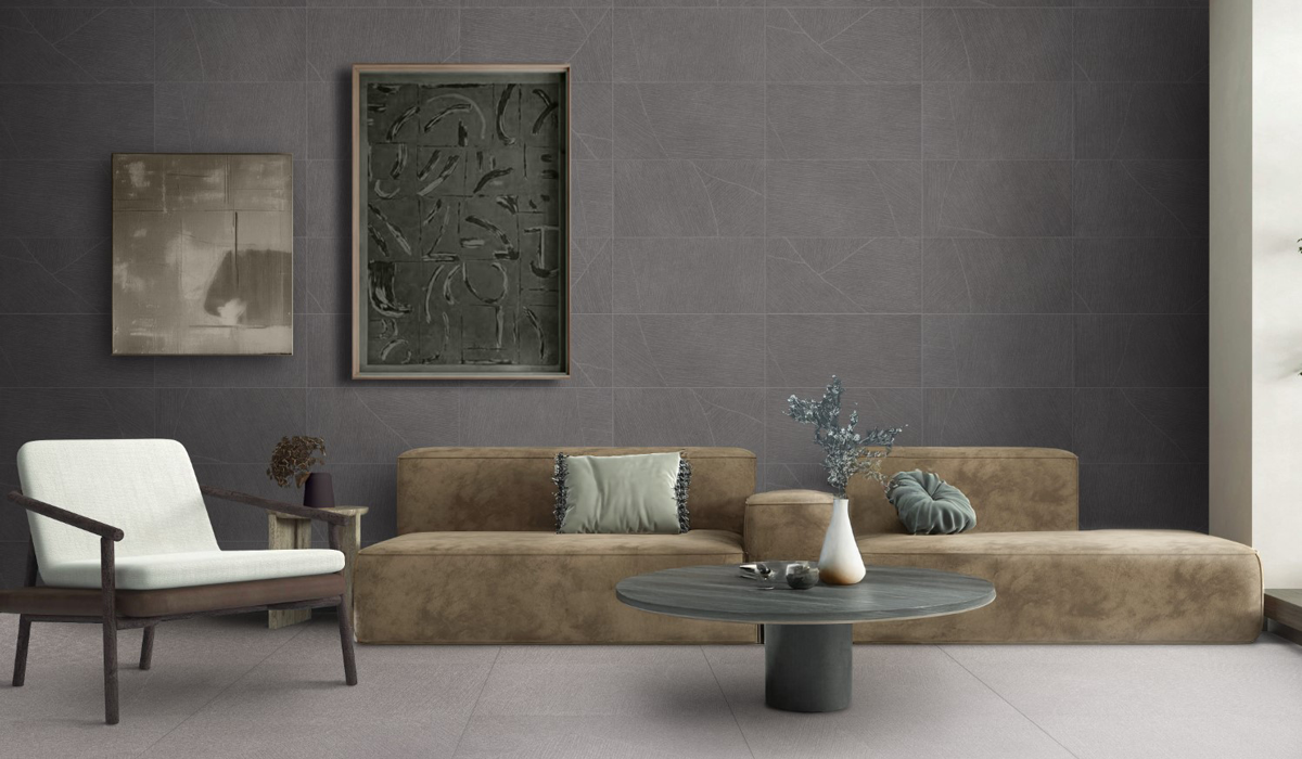living room with gray tile and tan couches