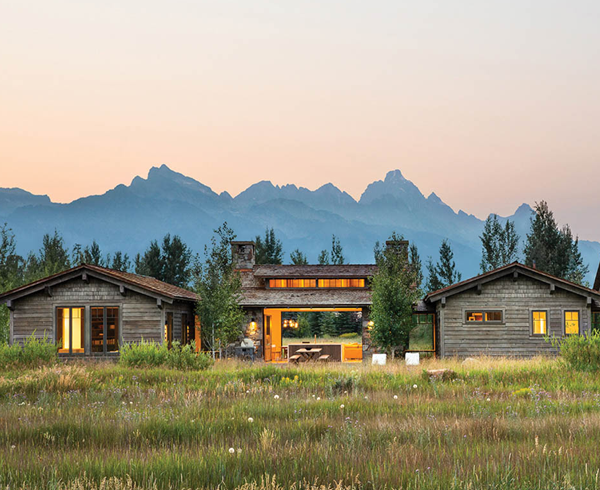 a mountain home in Jackson, Wyoming at sunset