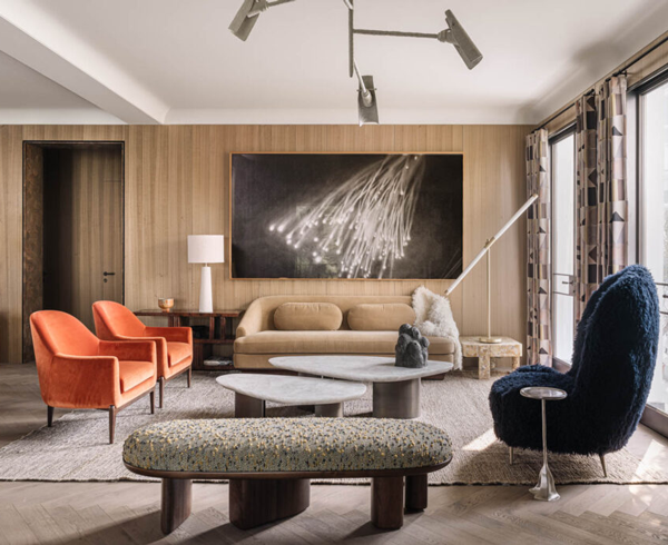 a natural-toned living room with pops of color