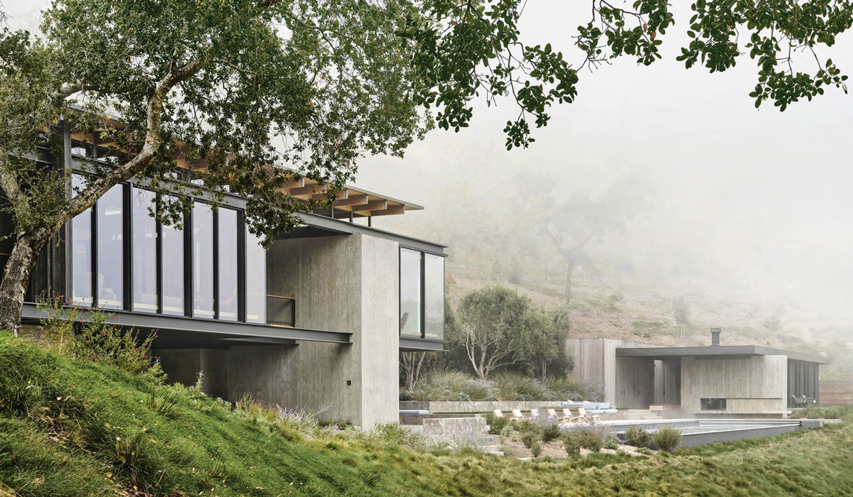 A mountain home in the fog
