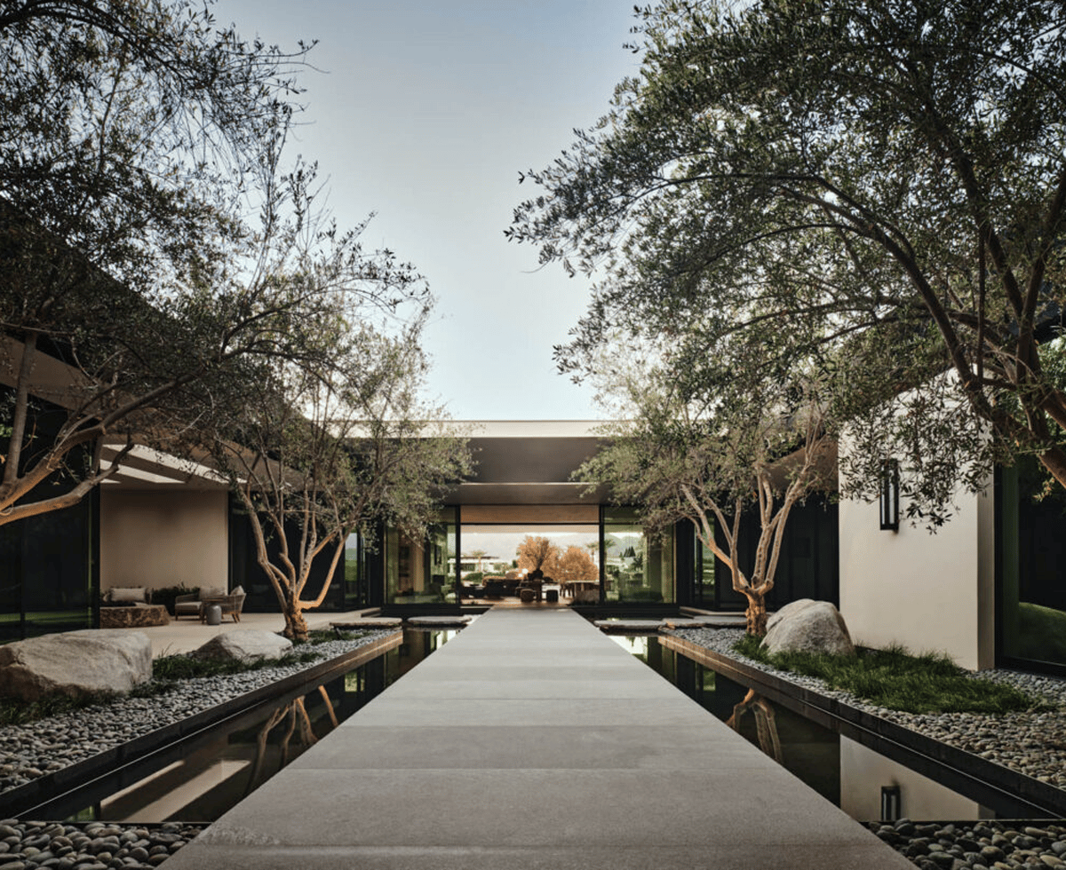 exterior courtyard with lush greenery and water features