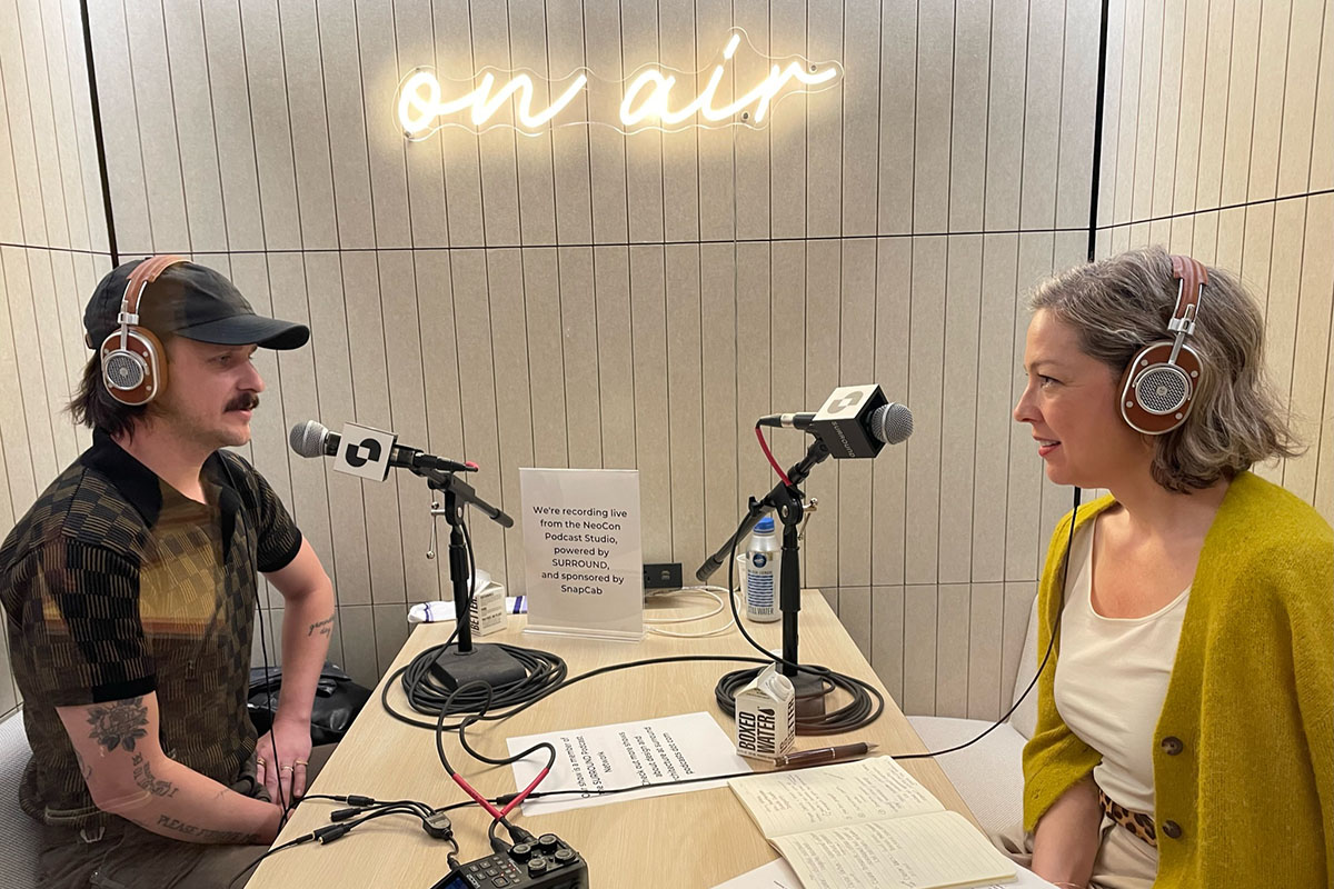 Clever podcast host on air with guest