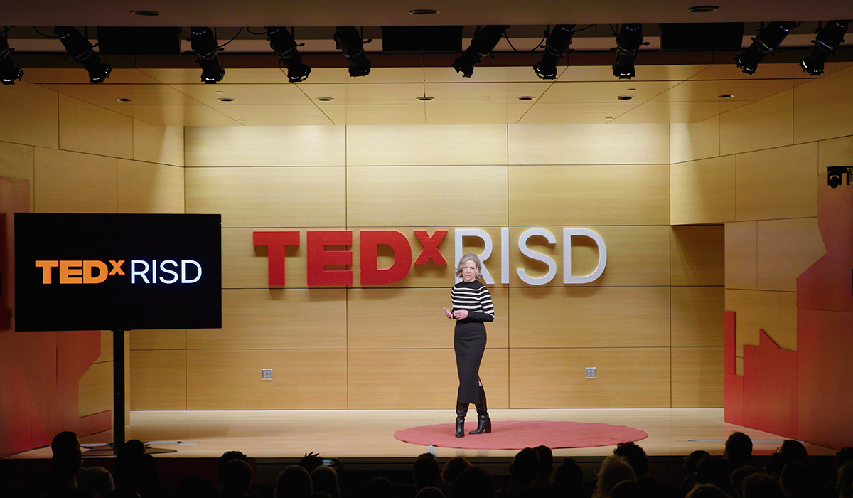 Clever podcast host on stage