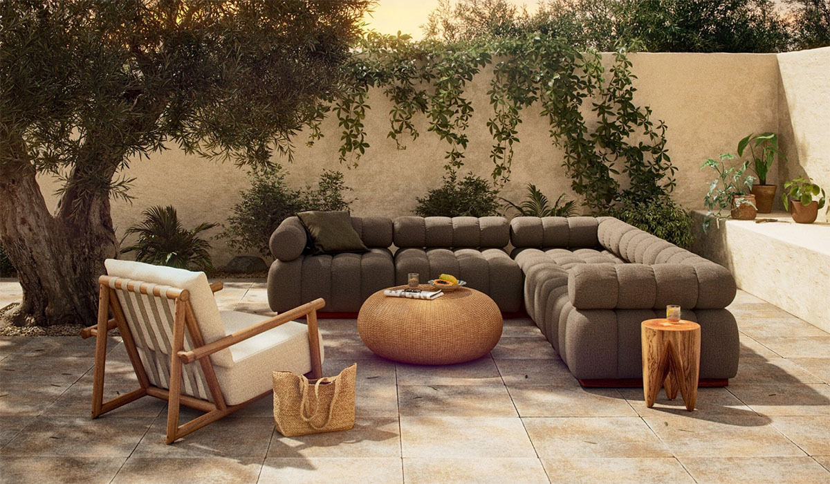 Elevated outdoor furnishings foster a seamless transition between interior and exterior environments.