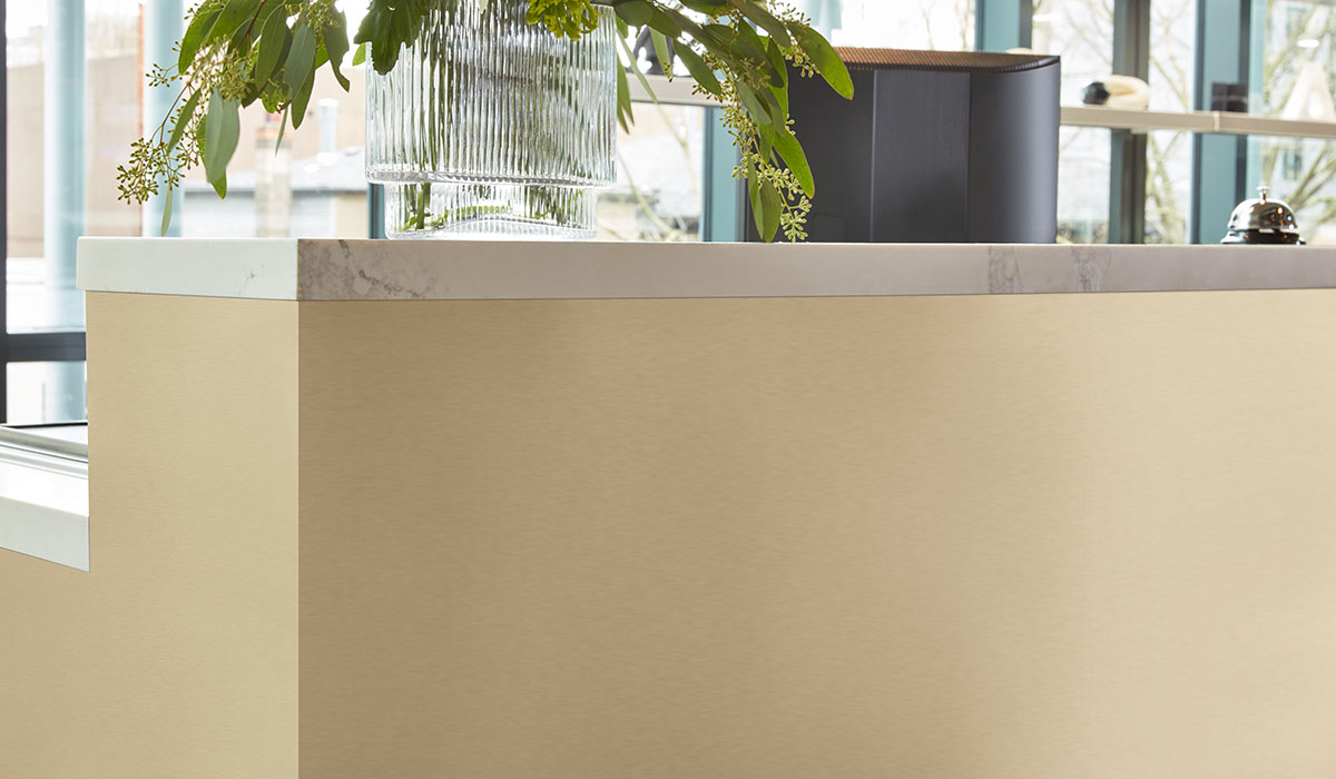 Reception desk with metal laminate.