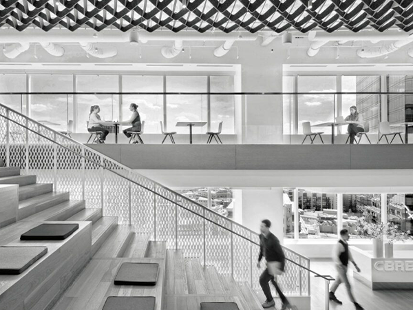 Black and white photo of a staircase in an office interior